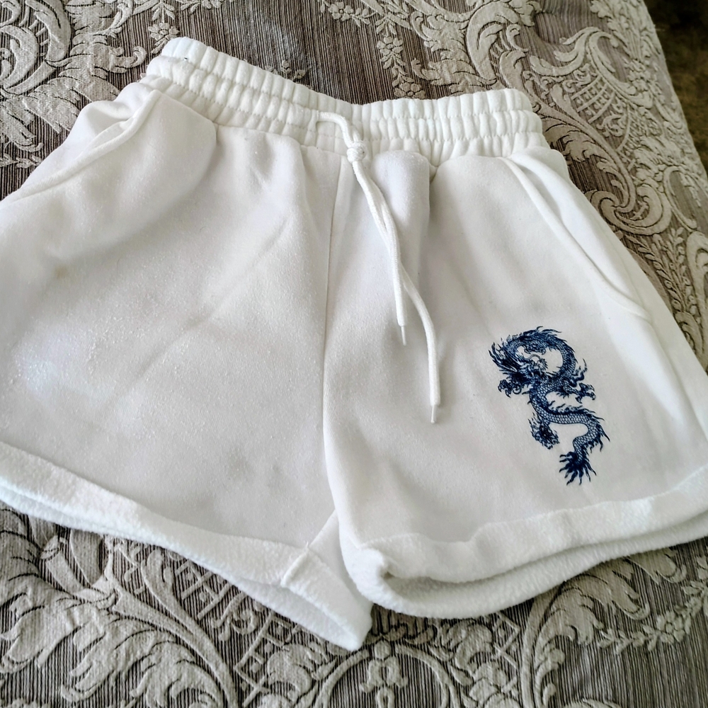 Justify White Athletic Shorts with Blue Dragon Embroidery